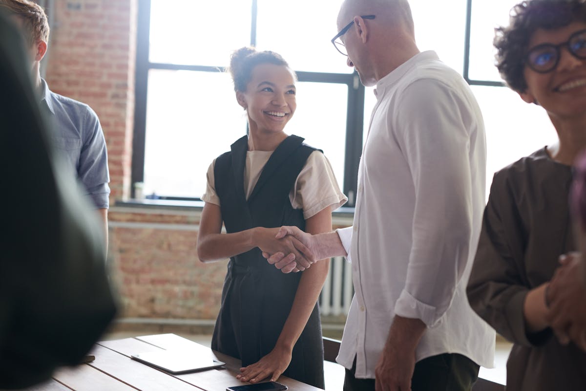 Man And Woman Shaking Hands