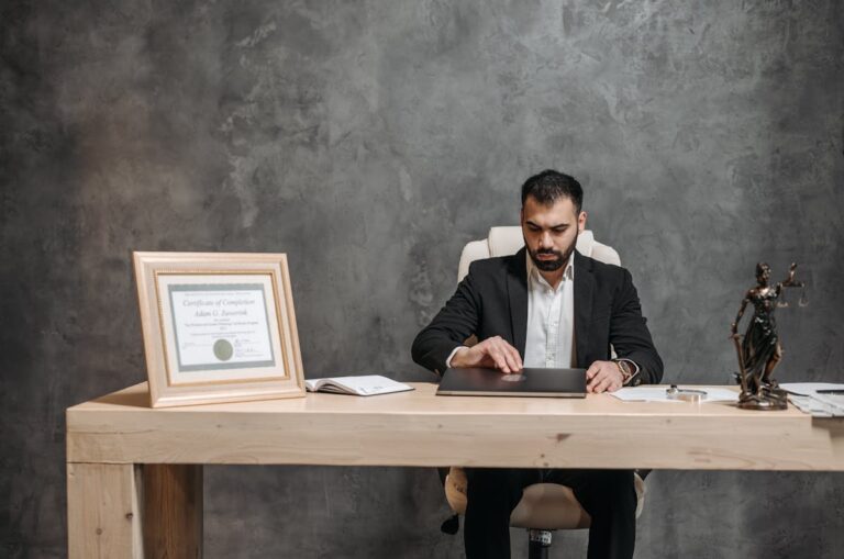 bearded lawyer working at his office desk, showing professionalism and expertise.